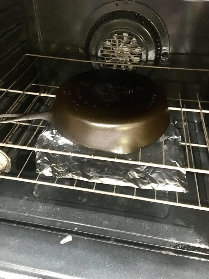 cast iron skillet turned upside down in an oven