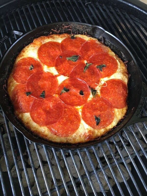 grilled cast iron pizza cooking
