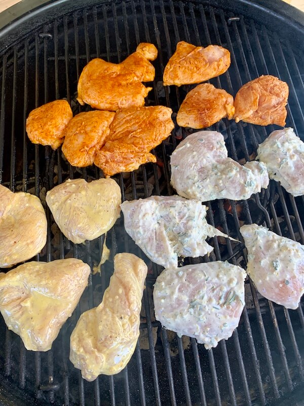 marinated chicken breasts on a charcoal grill