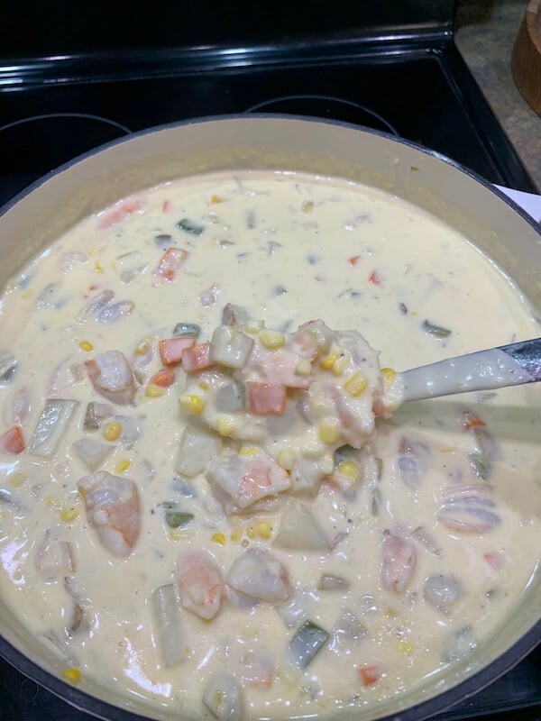 creamy shrimp and corn soup in a pot