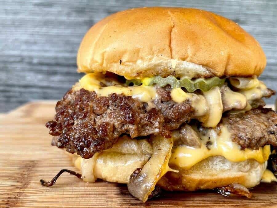 Basic smash burgers with weber gourmet burger seasoning and brioche buns :  r/blackstonegriddle