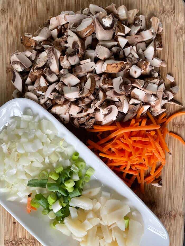 chopped mushrooms, onion, water chestnuts, green onions, and carrots