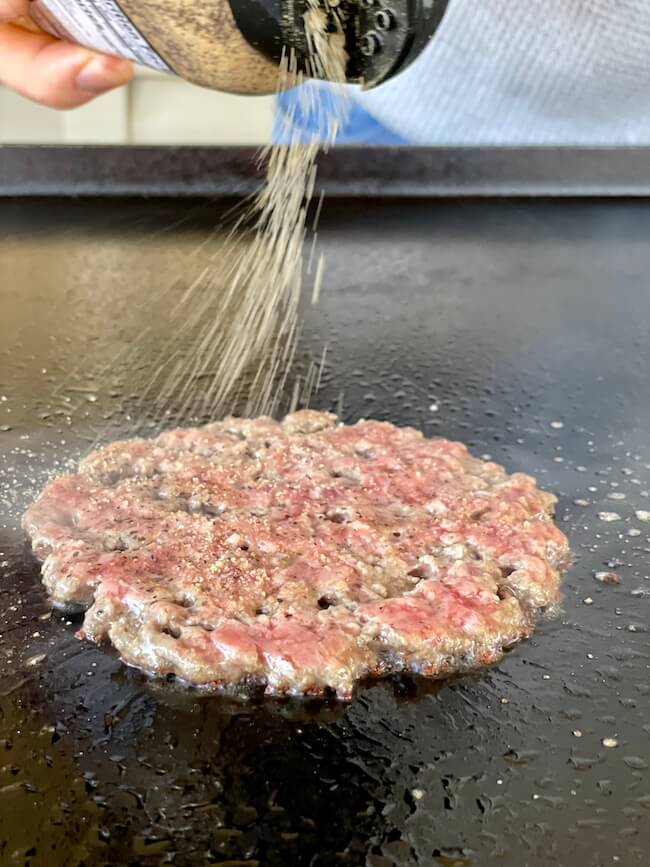 seasoning a smash burger