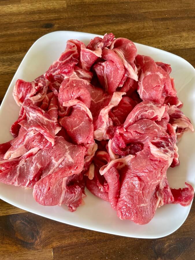 ribeye that has been sliced thin