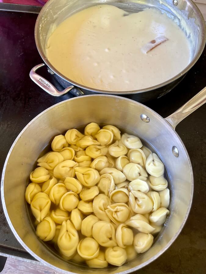 cooking tortellini and alfredo sauce