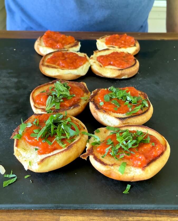 slider buns with marinara sauce and fresh basil