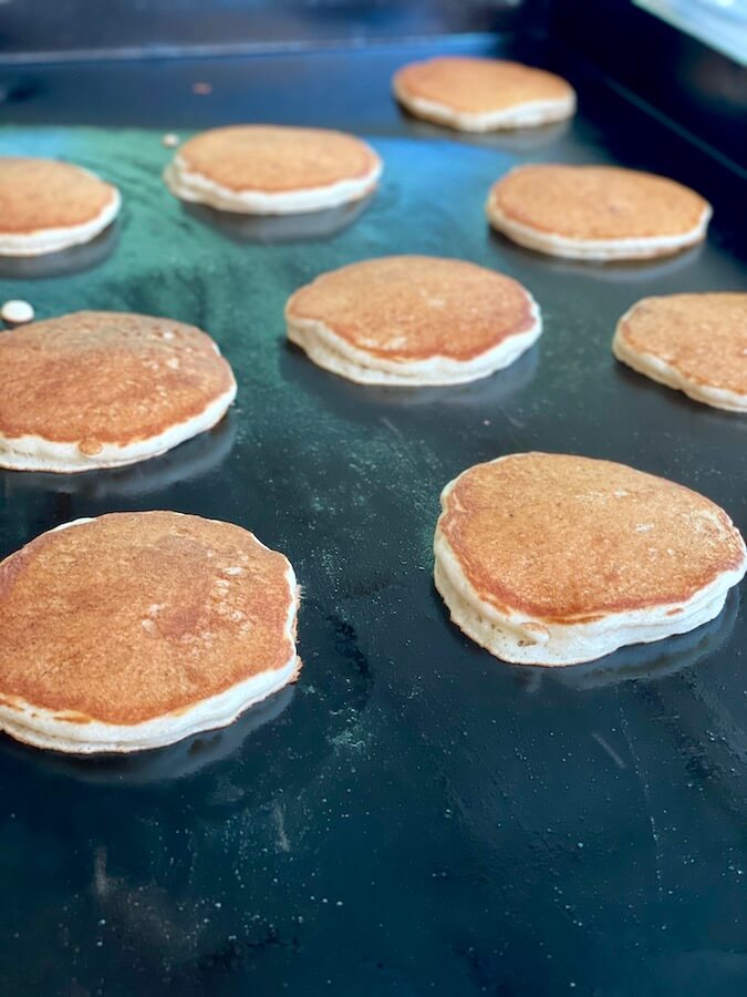 cooking pancakes on the griddle