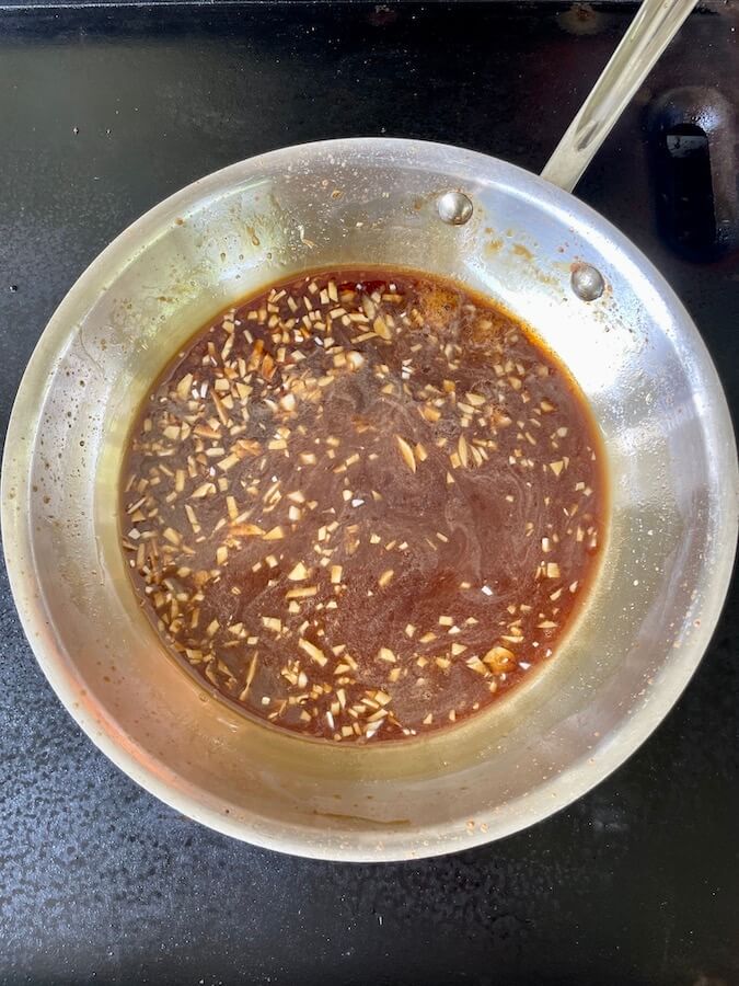 Hawaiian teriyaki sauce cooking in a skillet