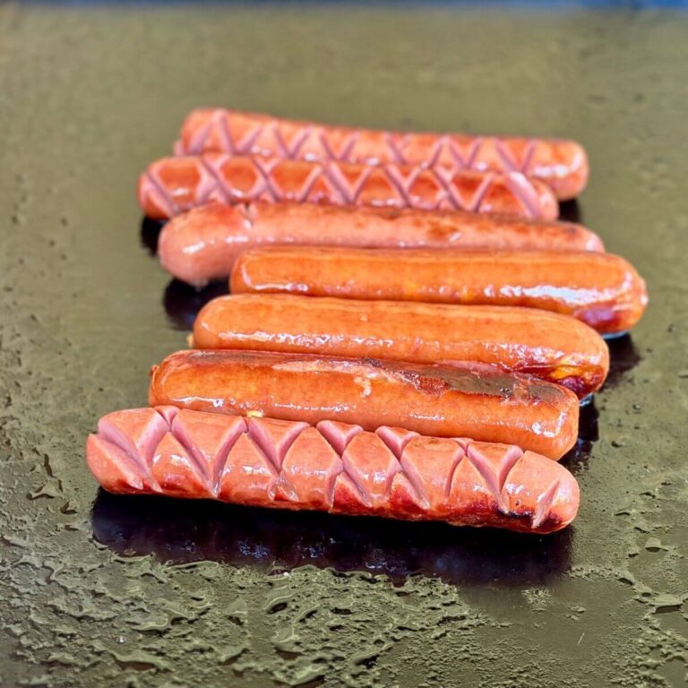 cooking hot dogs on the Blackstone griddle