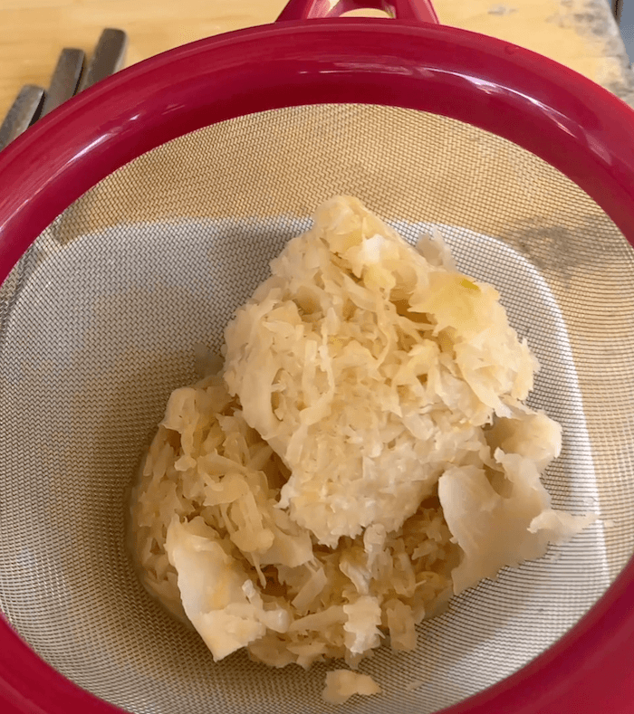 draining sauerkraut