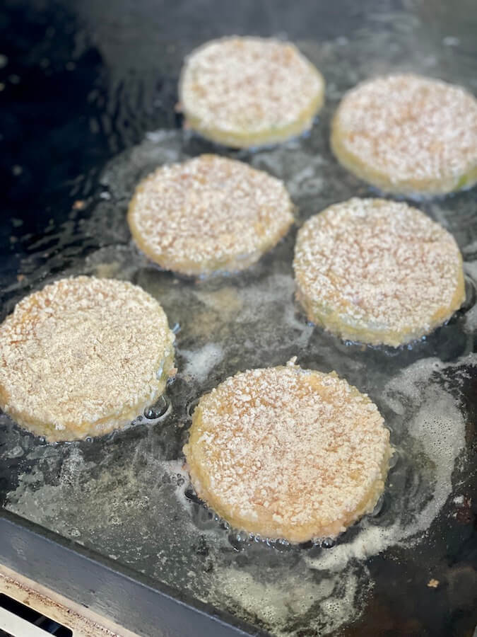 cooking fried green tomatoes on the griddle