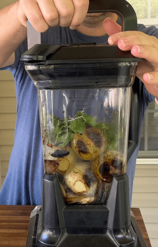 grilled tomatillos, onions, jalapeno, and cilantro in a blender