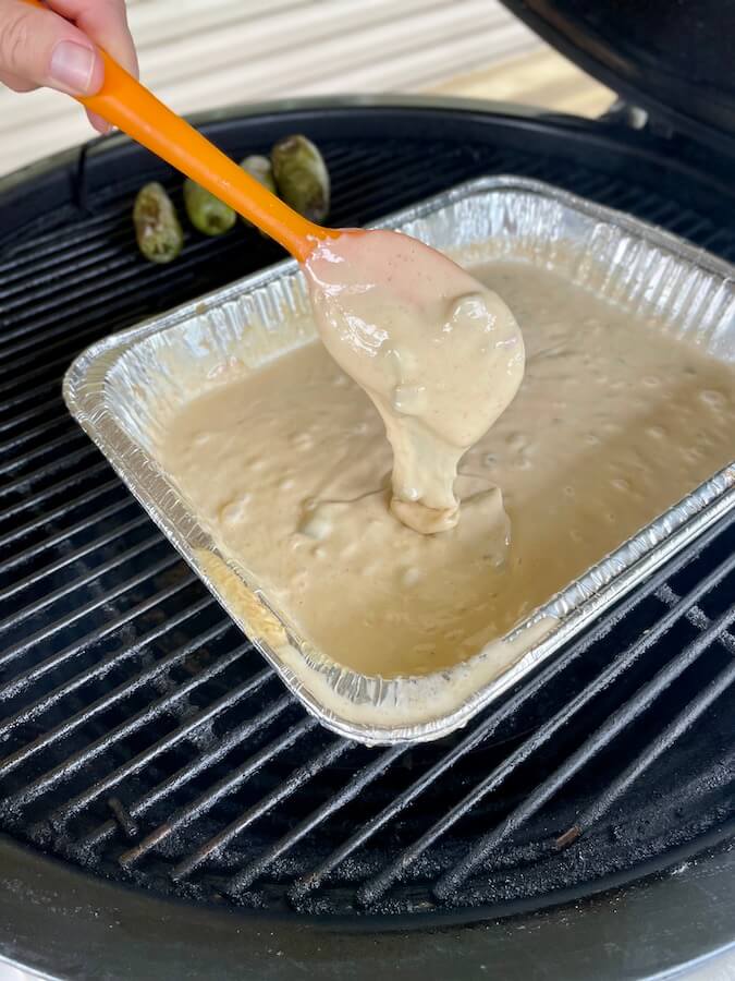 white queso dip smoking on the grill