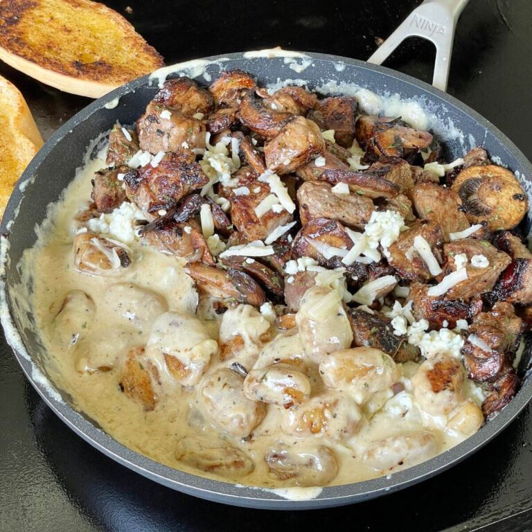 steak bites and gnocchi in a garlic cream sauce