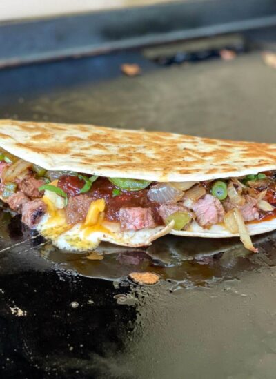 barbecue steak quesadilla on a griddle
