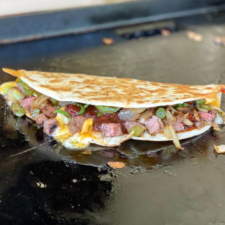 barbecue steak quesadilla on a griddle