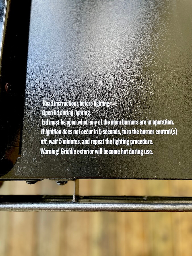 warning label saying to not use the hood while griddle is in use
