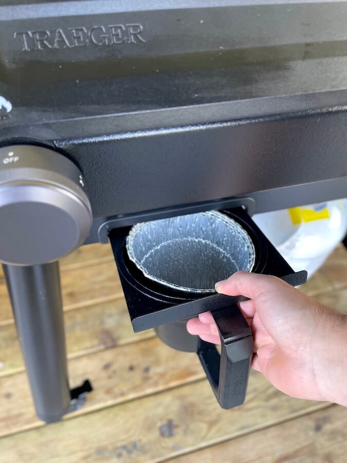 grease trap cup in the front of the Traeger flatrock griddle