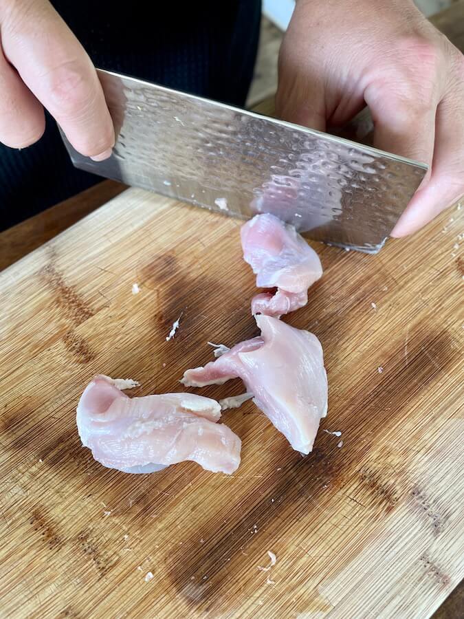 cutting boneless skinless chicken thighs