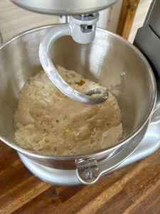 mixing naan bread dough in a stand mixer