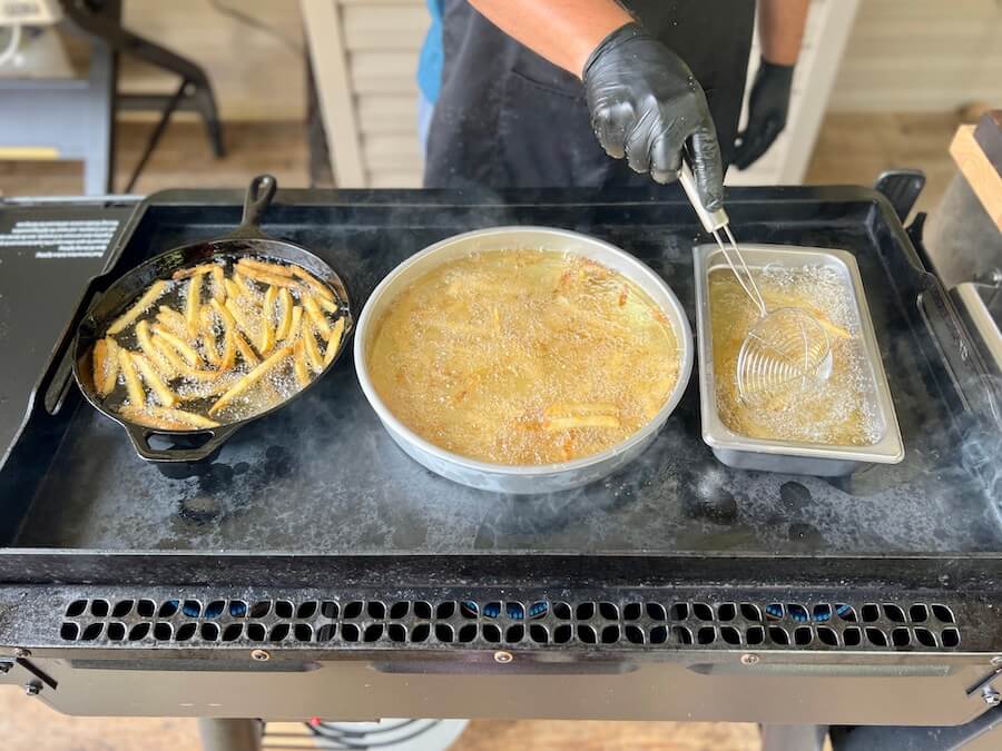 deep frying on the griddle in three different types of pans