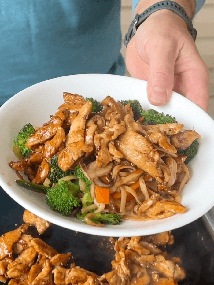 chicken stir fry with noodles in a bowl