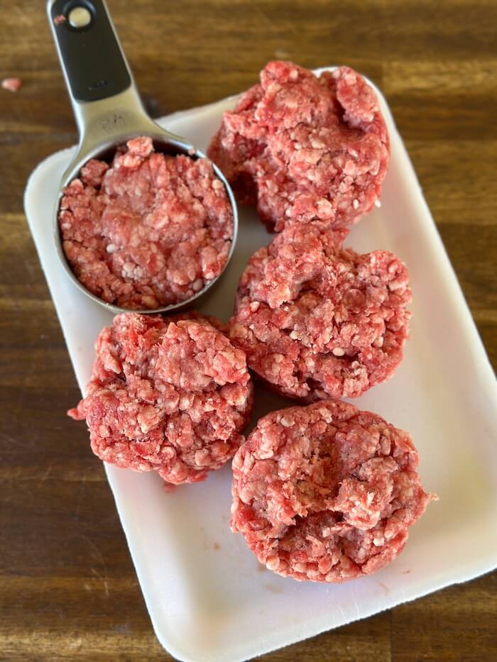 ground beef portioned out into 1/2 cup portions