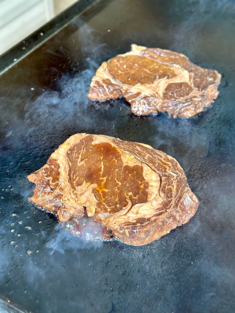 cooking Hawaiian ribeye steaks