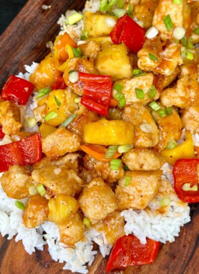 homemade sweet and sour chicken over white rice