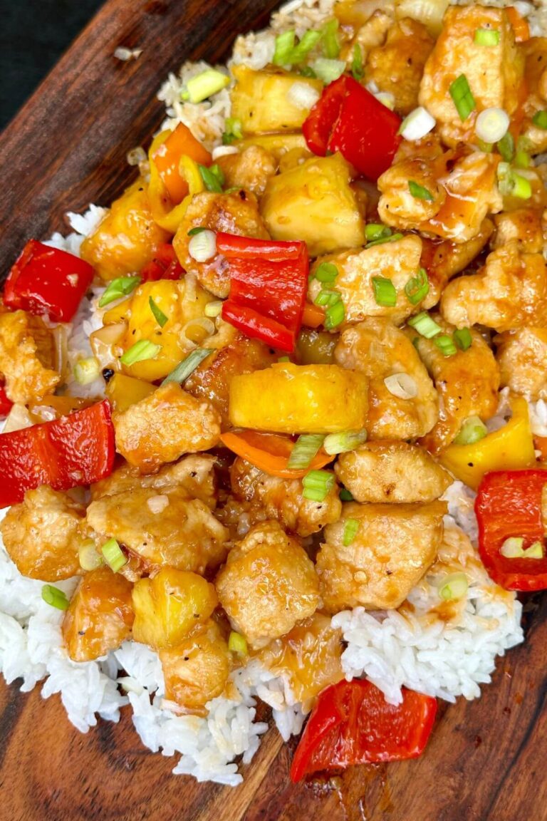 homemade sweet and sour chicken over white rice