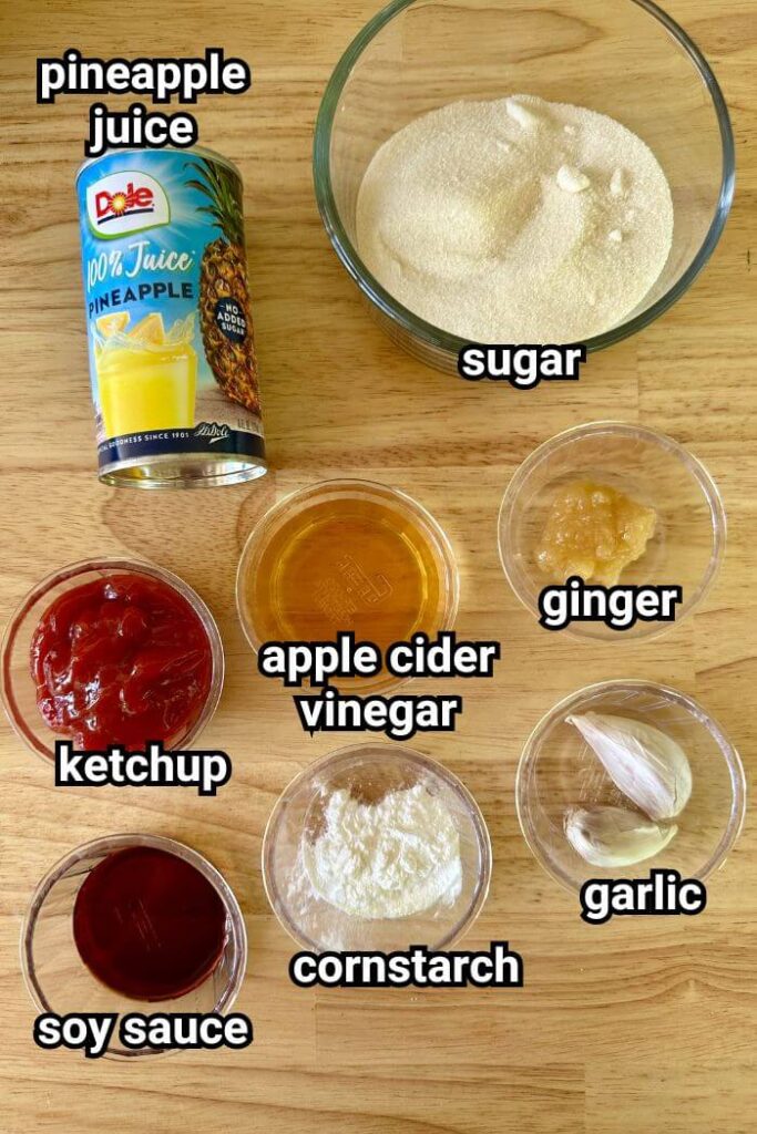 ingredients for sweet and sour chicken sauce measured out in bowls