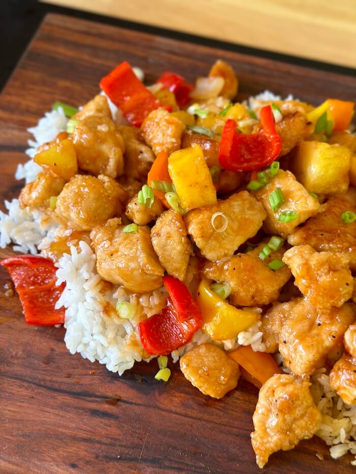 sweet and sour chicken over white rice