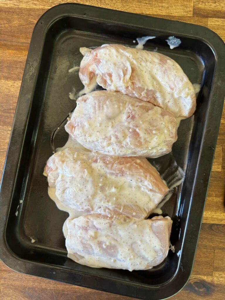 chicken breasts marinating in Italian dressing