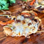 loaded Mexican chicken breasts topped with chorizo, fajita vegetables, and cheese