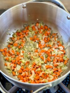 sautéing diced carrots, celery, and onion