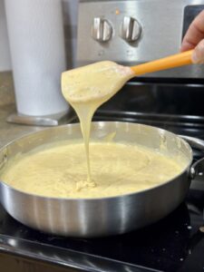creamy cheese sauce in a skillet