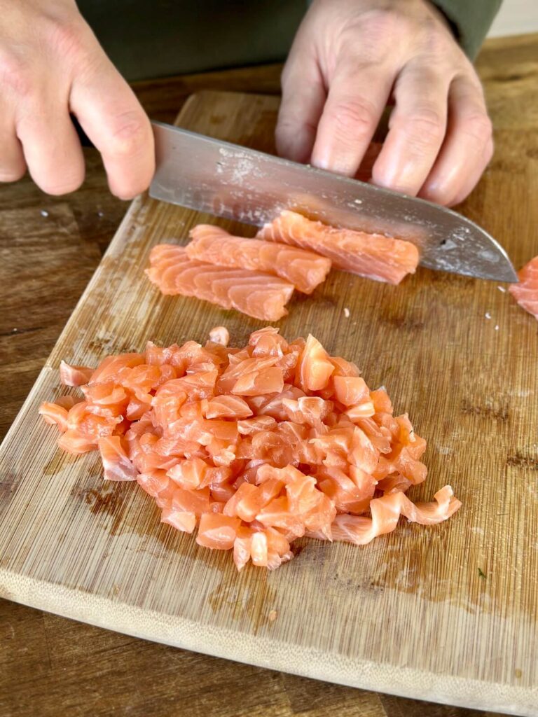 finely dicing fresh salmon