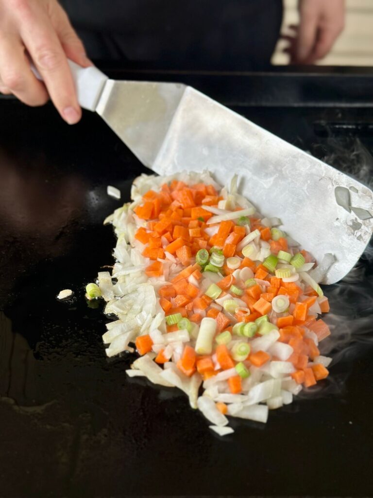 sauteeing onions and diced carrots