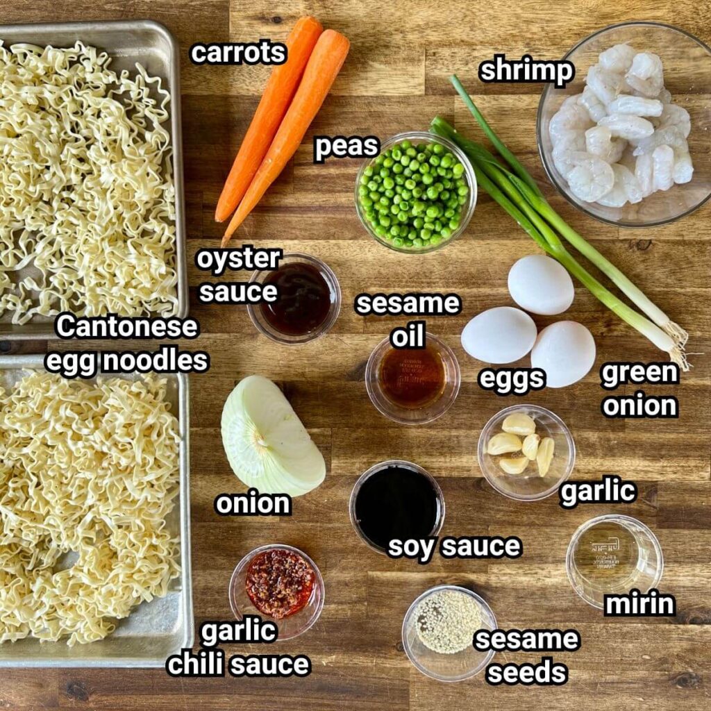 ingredients for shrimp and noodle stir fry measured out into bowls