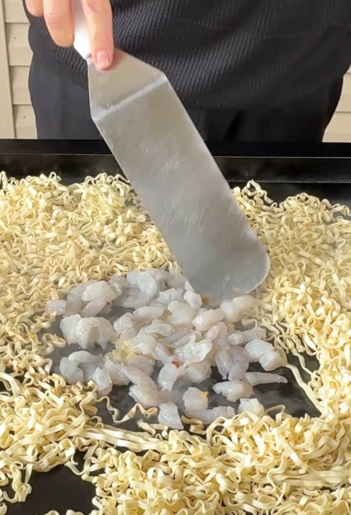 cooking shrimp on a griddle