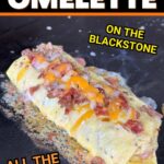 loaded meat omelette on a blackstone griddle