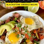 Mexican breakfast bowl with potatoes, steak, pico de gallo, and eggs