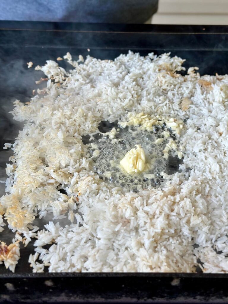 making tropical coconut fried rice on a griddle