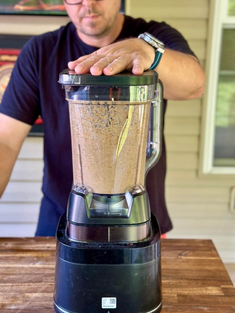 making jerk chicken marinade in a blender