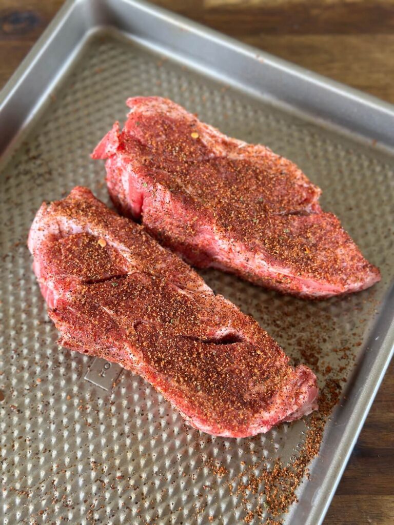 chuck eye steaks seasoned with Mexican seasoning