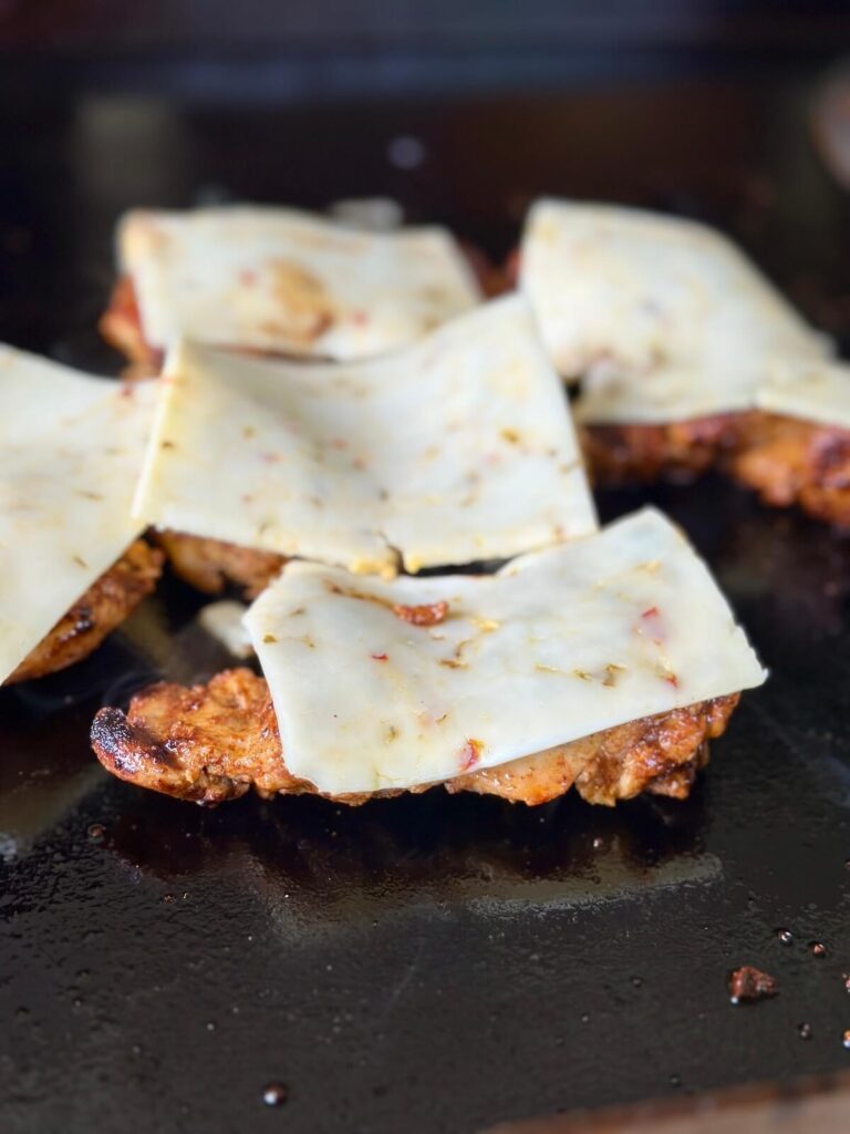 Mexican grilled chicken with pepper jack cheese slices