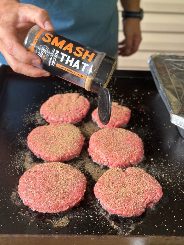 seasoning burger patties with Smash That burger seasoning