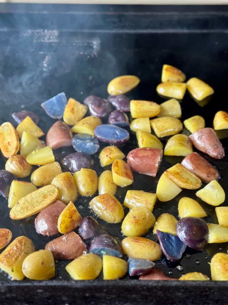 cooking potatoes on a griddle