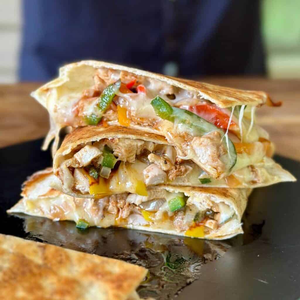 chicken fajita quesadilla with Mexican chicken, melty cheese, and peppers and onions
