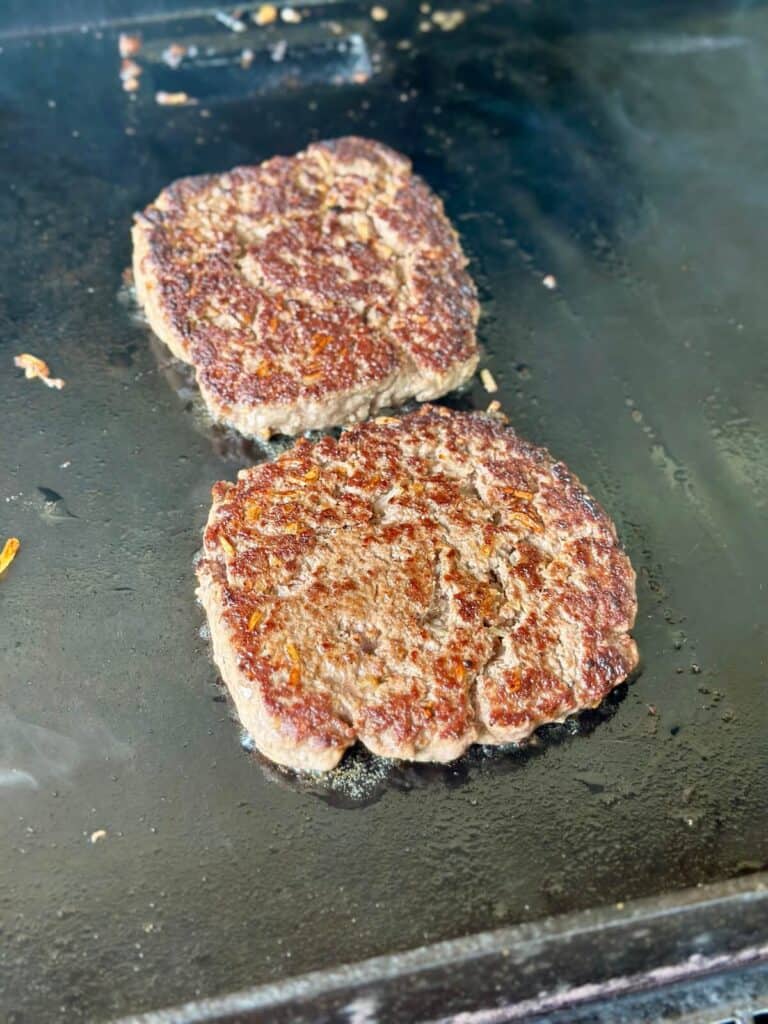 cooking french onion burgers